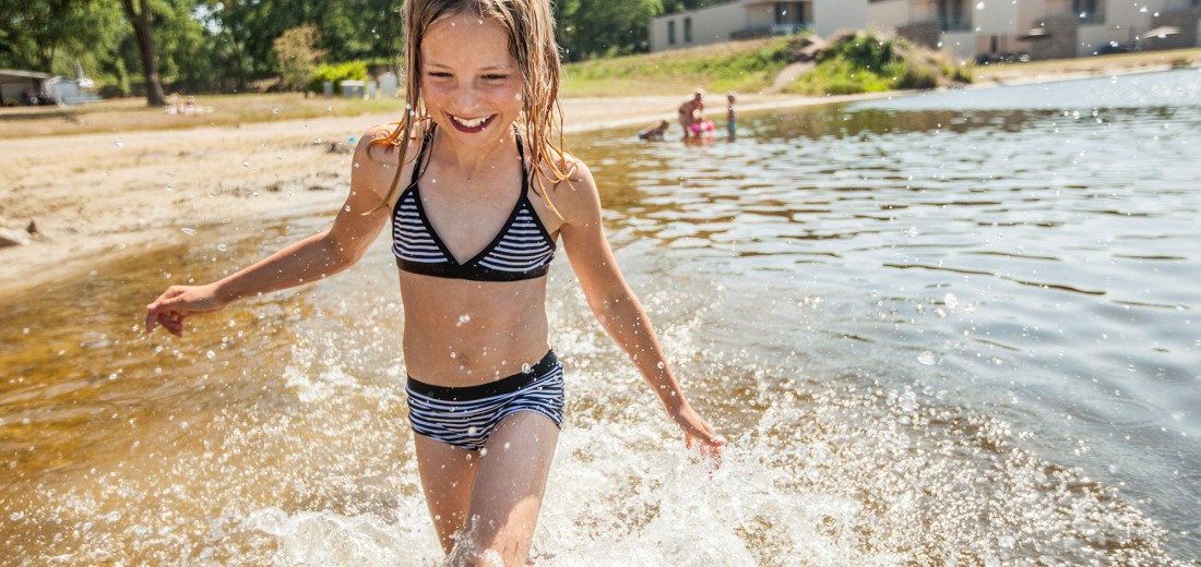 Spetteren in het zwemmeer